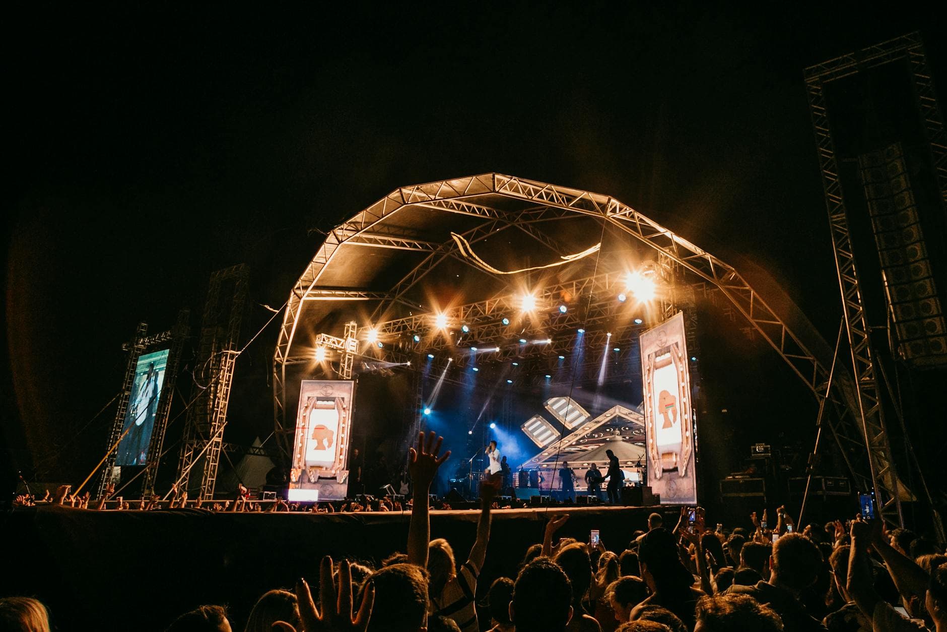 Outdoor festival stage with crowd